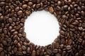 Coffee beans in arch on a white background text space in centre Royalty Free Stock Photo