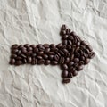 Coffee beans arranged in the shape of a right-pointing arrow Royalty Free Stock Photo