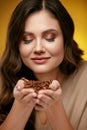 Coffee Beans. Beautiful Woman Smelling Coffee Beans Royalty Free Stock Photo