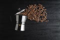 Coffee beans and bialetti coffee maker. Moka pot