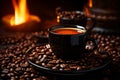 coffee beans on a black background with a cup of coffee in front of a fire banco de imagens