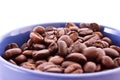 Coffee beans in blue cup isolated Royalty Free Stock Photo