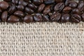 Coffee beans border line on old sack Royalty Free Stock Photo