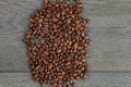 Coffee beans border on old oak table Royalty Free Stock Photo