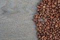 Coffee beans border on old oak table Royalty Free Stock Photo