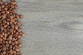 Coffee beans border on old oak table Royalty Free Stock Photo
