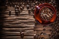 Coffee beans bowl on vintage wooden board Royalty Free Stock Photo