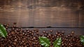 Coffee beans in a brown wooden background and with coffee leaves in the form of damaged and weathered surfaces use of general