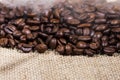 Coffee beans on burlap background Royalty Free Stock Photo