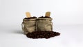 Coffee beans in a burlap bag on a white background. Royalty Free Stock Photo