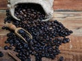 Coffee beans, burlap sack, bag and scoop Royalty Free Stock Photo