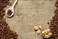 Coffee beans, cane sugar - linen cloth background top view Royalty Free Stock Photo