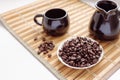 Coffee beans and cezve on white background, Roasted coffee beans and turk (cezve) Royalty Free Stock Photo