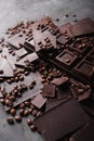 Coffee beans with chocolate dark chocolate. Broken slices of chocolate. Chocolate bar pieces. Royalty Free Stock Photo