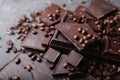 Coffee beans with chocolate dark chocolate. Broken slices of chocolate. Chocolate bar pieces. Royalty Free Stock Photo