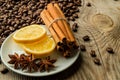 Coffee beans with cinnamon and anise and lemon Royalty Free Stock Photo