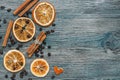 Coffee beans,cinnamon and dried orange on wooden surface ,blue toning,top view. Heart of orange peel. Royalty Free Stock Photo