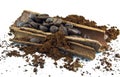 Coffee beans, cinnamon and ground coffee