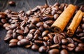 Coffee beans,cinnamon sticks,aroma, coffee,natural, bean, spices, drink, food, brown, on wooden background Royalty Free Stock Photo