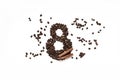 Coffee beans with cinnamon on a white background, March 8
