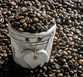 coffee beans in a clay pot Royalty Free Stock Photo