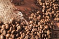 Coffee beans on a table with burlap. Royalty Free Stock Photo