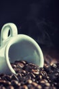 Coffee beans. Coffee cup full of coffee beans. Toned image Royalty Free Stock Photo