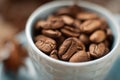 Coffee beans in a cup Royalty Free Stock Photo