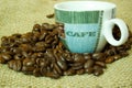 Coffee beans and cup