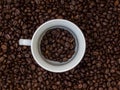 Coffee beans in a cup,cup of coffee with beans Royalty Free Stock Photo