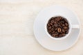Coffee beans on a coffee cup Royalty Free Stock Photo