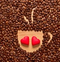 Coffee beans cup and two heart Royalty Free Stock Photo