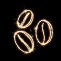 Three coffee beans drawn by sparklers on a black background imitating a long exposure