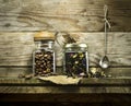 Coffee beans and dry tea in glass jars Royalty Free Stock Photo