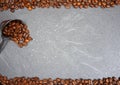 Coffee beans Fair Trade and spoon at grey kitchen worktop background Royalty Free Stock Photo