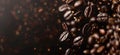 Coffee beans falling on brown background, closeup view Royalty Free Stock Photo