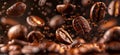 Coffee beans falling on brown background, closeup view Royalty Free Stock Photo