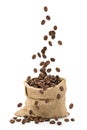 Coffee beans falling into sack bag Royalty Free Stock Photo