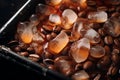 Coffee beans frozen in an ice block background Royalty Free Stock Photo