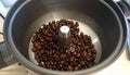 Coffee beans in a grinder bowl Royalty Free Stock Photo