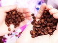 Coffee beans in hands Royalty Free Stock Photo