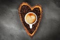Coffee beans in a heart shaped bowl Royalty Free Stock Photo