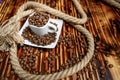 Coffee beans inside square espresso cup Royalty Free Stock Photo