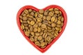 Coffee beans isolated on a white background. Full of coffee beans in a heart shaped plate Royalty Free Stock Photo