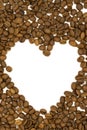 Coffee beans isolated on a white background. Heart shape with coffee beans Royalty Free Stock Photo