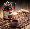 Coffee beans in jute bag with coffee grinder