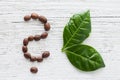 Coffee beans and leaves Royalty Free Stock Photo