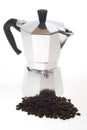 Coffee Beans and Moka on white Royalty Free Stock Photo