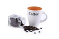 Coffee beans, mug and a glass container Royalty Free Stock Photo