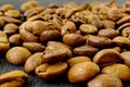 Coffee beans, natural textured brown background, morning espresso drink